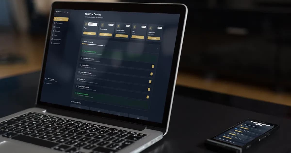 A business software dashboard displayed on a laptop and phone