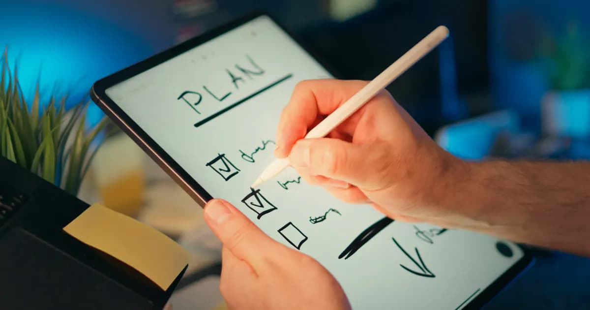 A project plan and checklist being written on a tablet